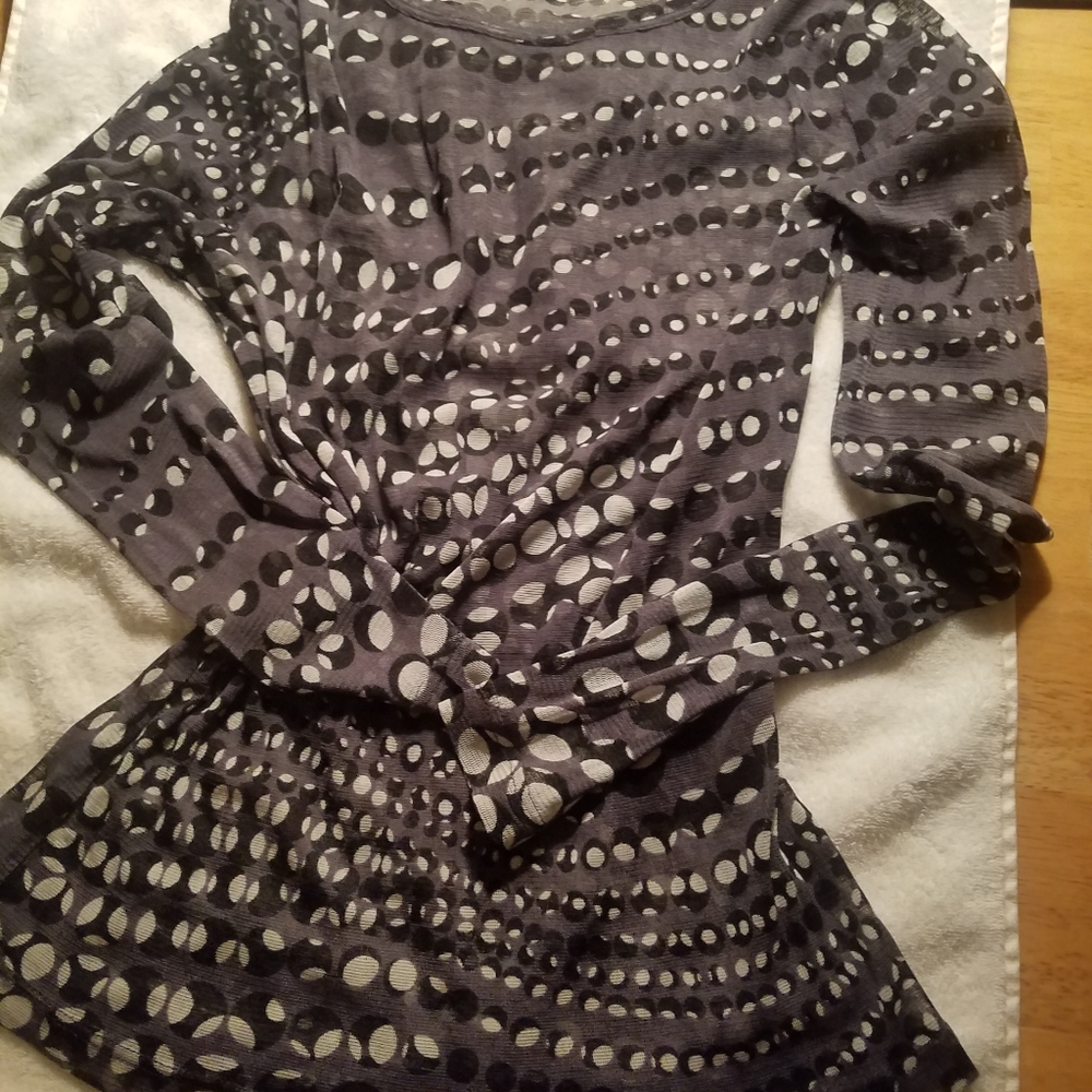 Women sheer silk top. Size medium, stretchy and lo